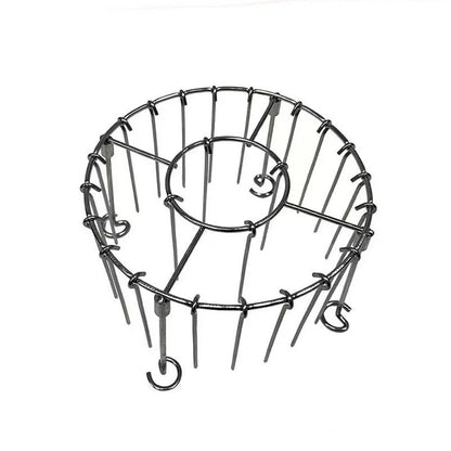 Ronde roestvrijstalen ovengrill met spies.