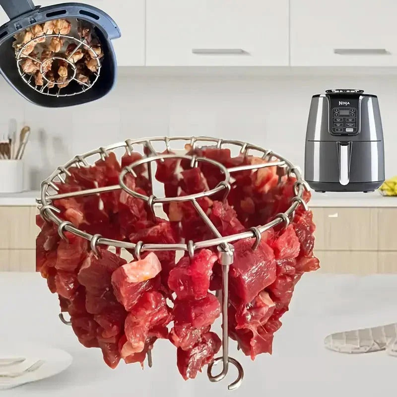 Ronde roestvrijstalen ovengrill met spies.
