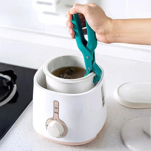 Multifunctionele anti-verbrandingskomhouderclip
